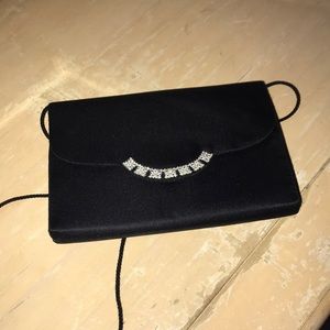 a mini bag with gems at opening